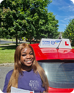 Young woman smiling proudly outdoors on a bright day, holding a certificate, excited expression-11